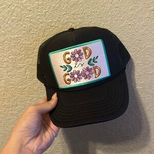 Black trucker hat - God is good patch - mid profile.